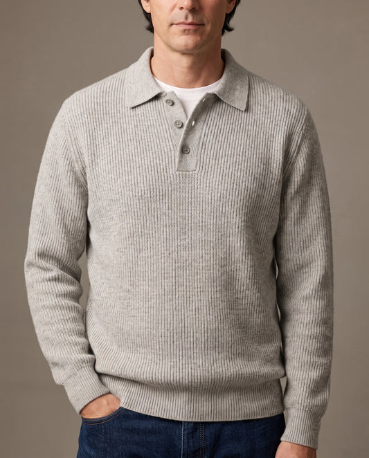 Model wearing a light gray ribbed knit polo sweater