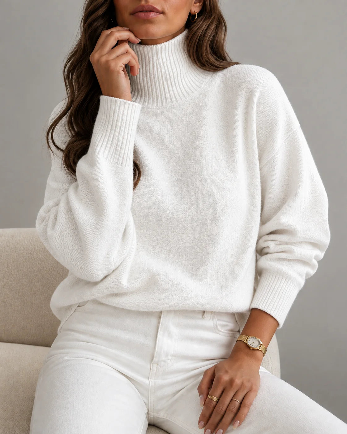woman wearing a cozy white ribbed turtleneck sweater